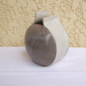 vase rond modelé par estampage